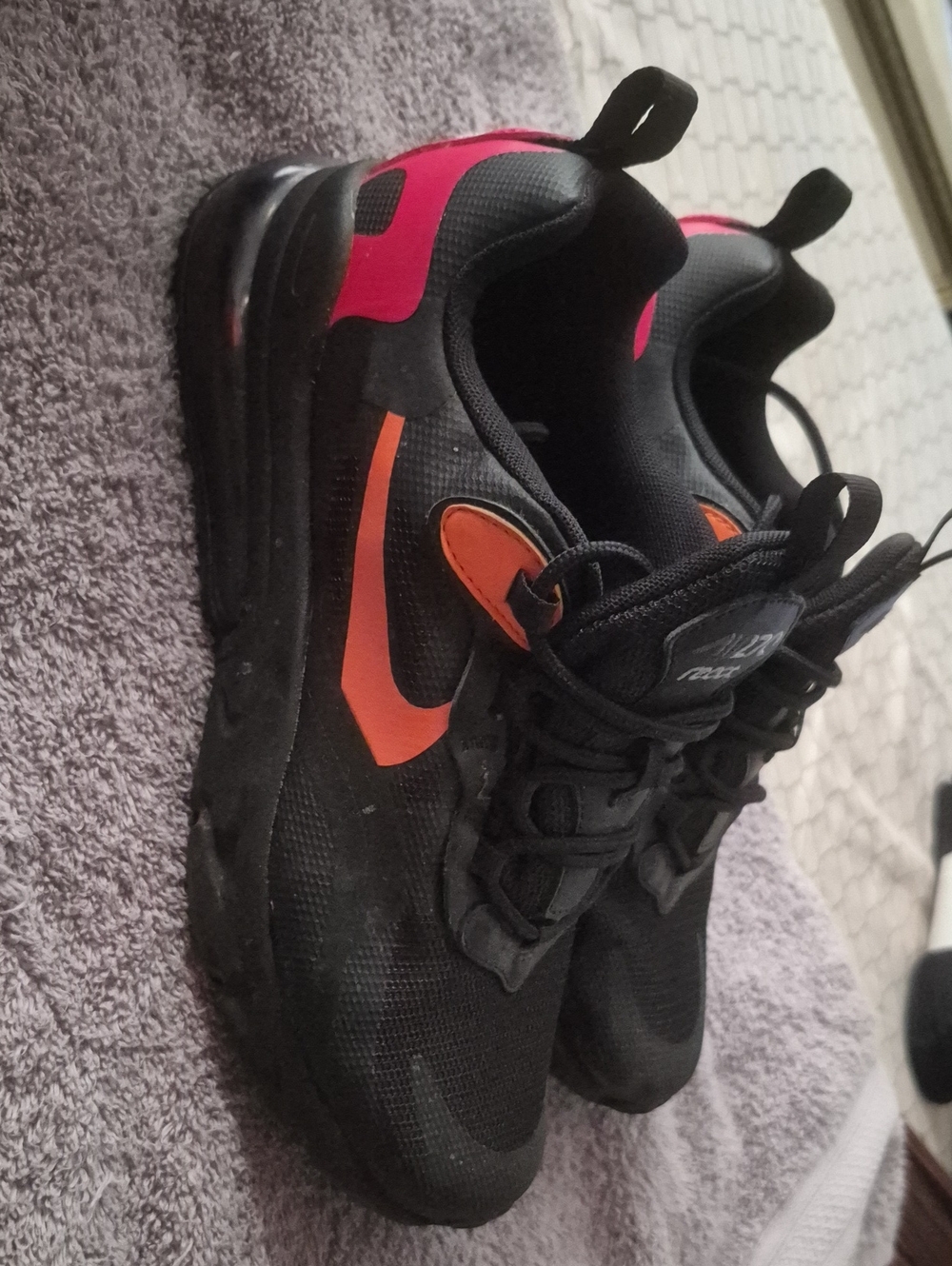 Nike Black Running Shoes with Orange Swoosh and Pink Heel